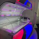 Side view of Ergoline Prestige Fusion Spectra with Fusion Light Technology and sleek design