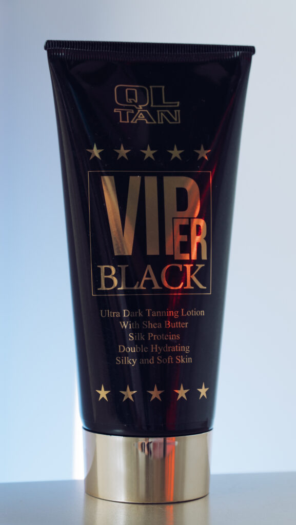 Ql Tan Viper Black Cosmetic Display At Solaris Tanning Studio Reception Area